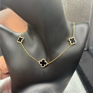 Elegant Sterling Silver Onyx Flower On Both Sides .